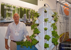 Laurens Trebes of Urban Ponics with vertical cultivation towers in the booth at Rovero.